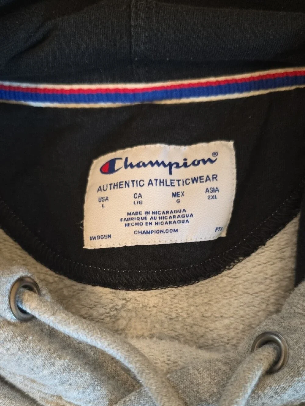 Champion Grey Pullover Hoodie with Black Hood Lining and Red Logo Detail